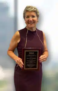 Donna Nesselbush receives an award