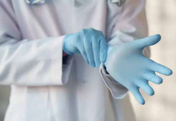 a nurse wearing hand glove