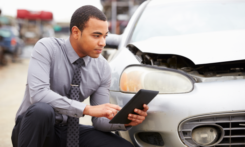 A law firm promotional image featuring a legal consultation.