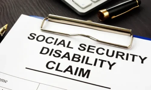 A close-up of a social security disability claim form.